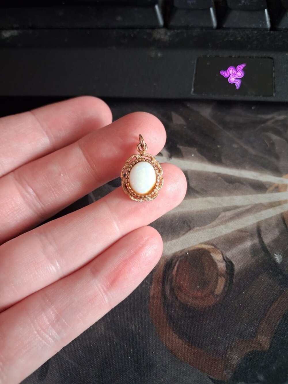 White stoned pendant